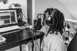 Woman recording music photo