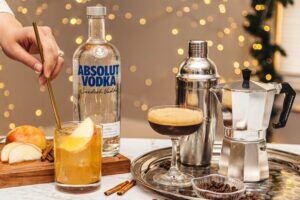 woman mixing holiday drink