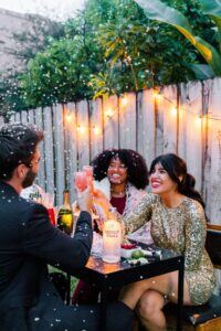 friends drinking holiday drinks