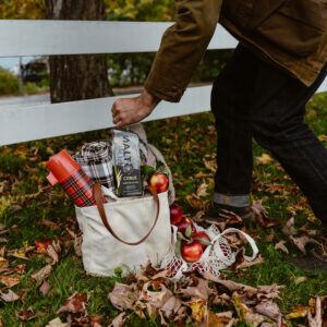 Man grabbing drink for picnic photo